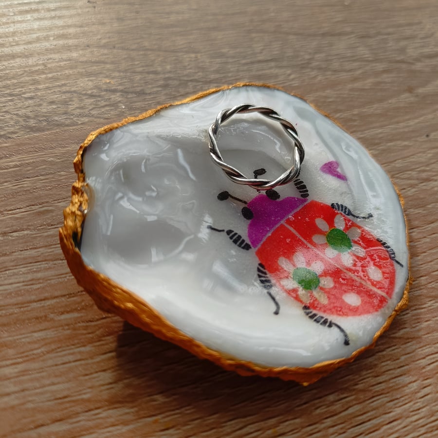Happy bug hand-finished oyster shell 
