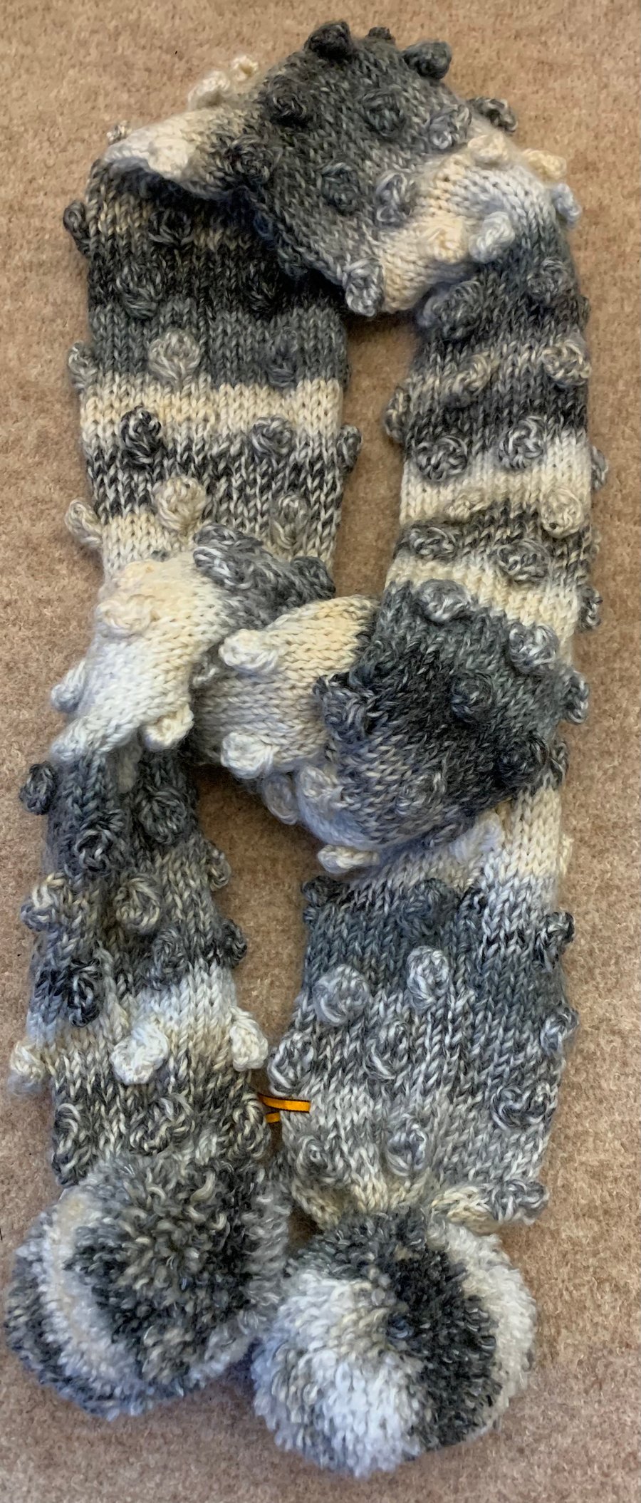 Hand Knitted Bobble Scarf in Variegated Greys and Cream