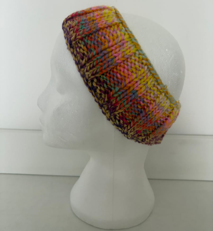 Hand knitted headband. 
