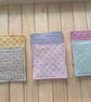 Set of six handmade coasters with sashiko embroidered patterns.