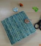 Needlecase made with green handwoven fabric