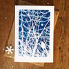 Bird in winter branches with twinkly lights card from Cyanotype image