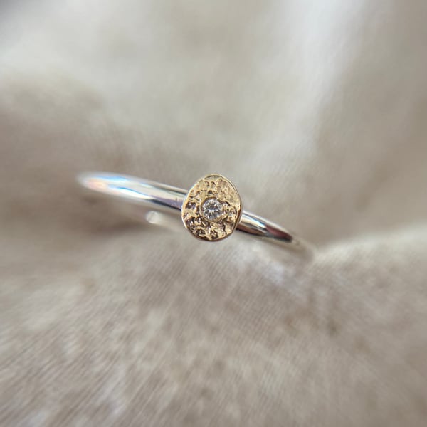 Genuine diamond in solid molten gold on a Sterling silver band 