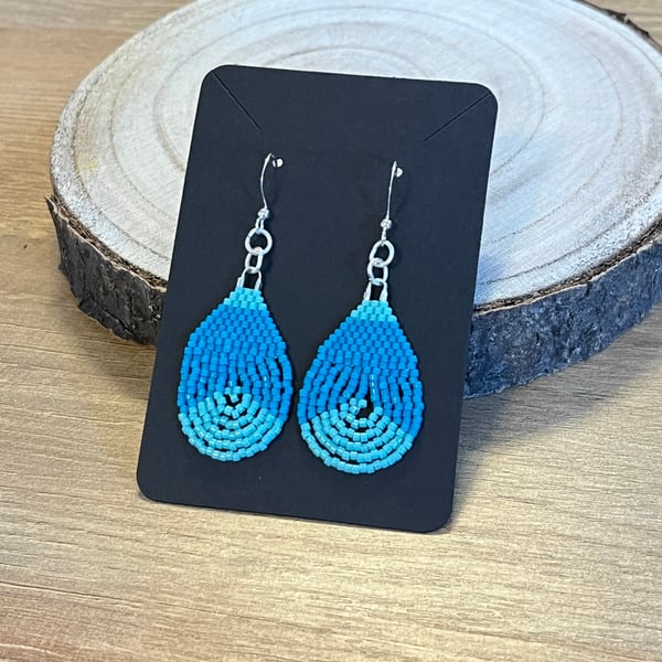 Colourful teardrop earrings in bright blue tones