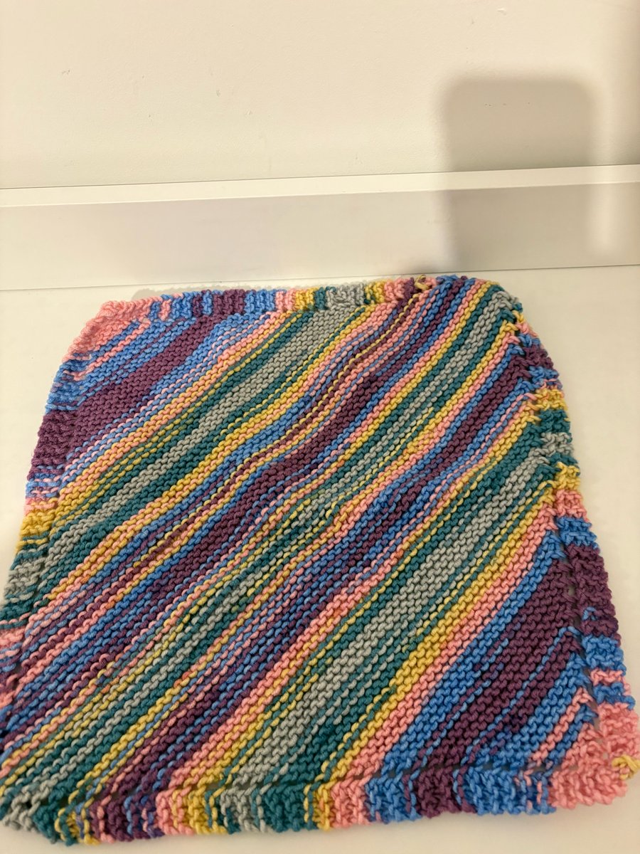 Hand knitted baby blanket. 