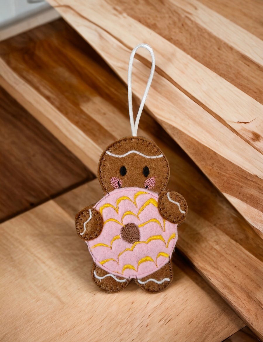 Gingerbread person holding a party ring biscuit Embroidered Hanging Keepsake 