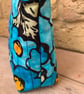 Bright Blue Floral Quilted Fabric Makeup Bag - Image 4