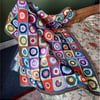 Hand crocheted sun burst square throw