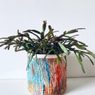 Vibrant textile storage or pot plant holder
