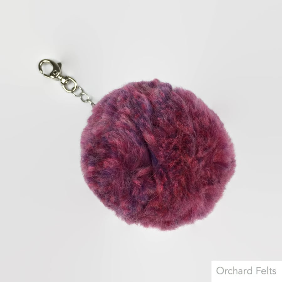 Merino wool pom pom bag charm in pink