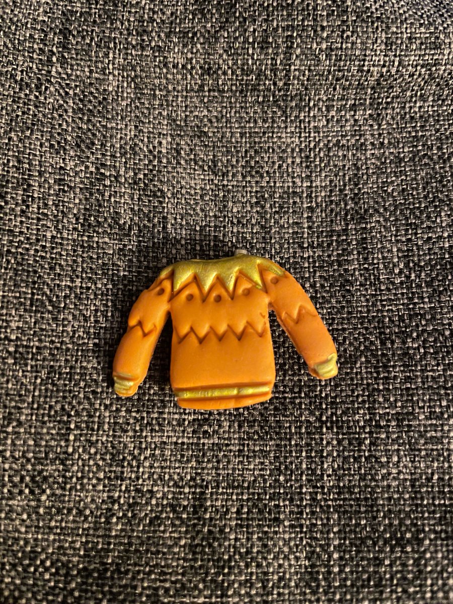 Gold and orange jumper polymer clay badge 