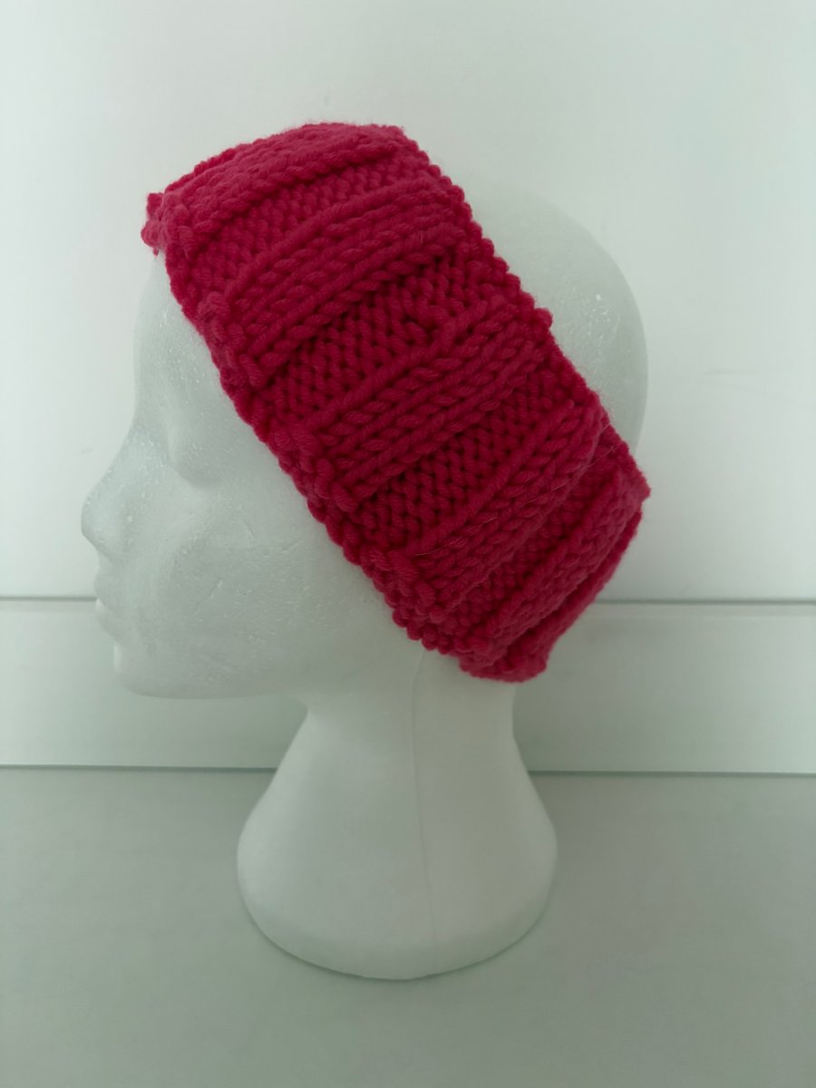 Hand knitted headband. 