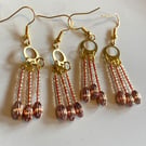 Rose Gold dangle drop beaded earrings.
