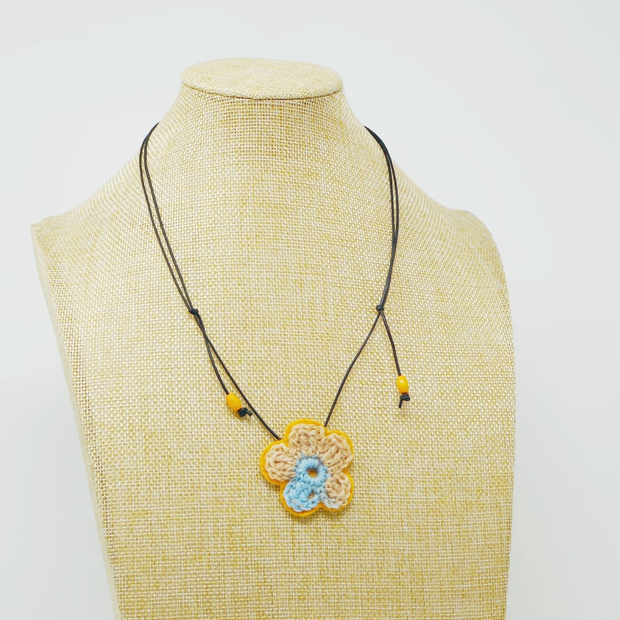 Delicate crochet blossom flower necklace in sand and golden yellow