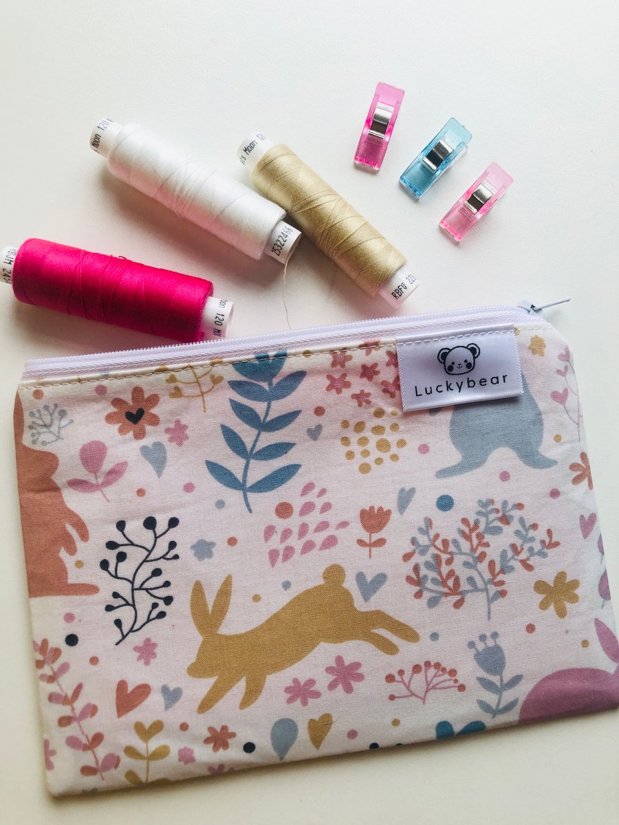 Cute rabbit print pouch in spring colours; small zip pouch in bunny print
