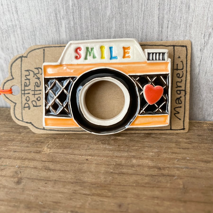 Ceramic camera magnet open lens orange