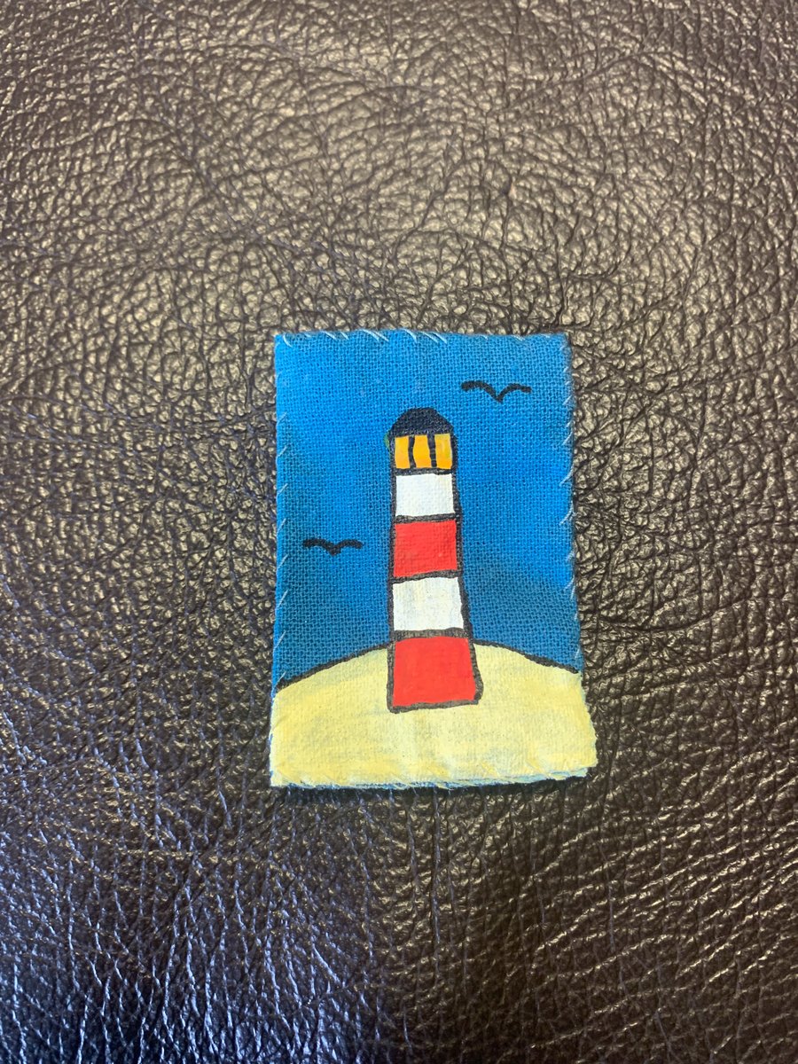 Lighthouse patch with blue background 