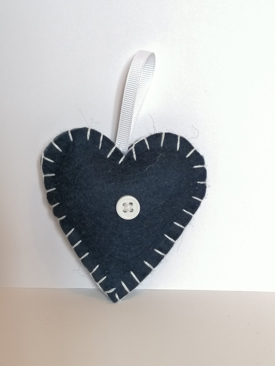 Handmade navy felt heart with white stitching, ribbon and button 