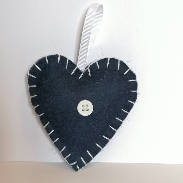 Handmade navy felt heart with white stitching, ribbon and button 