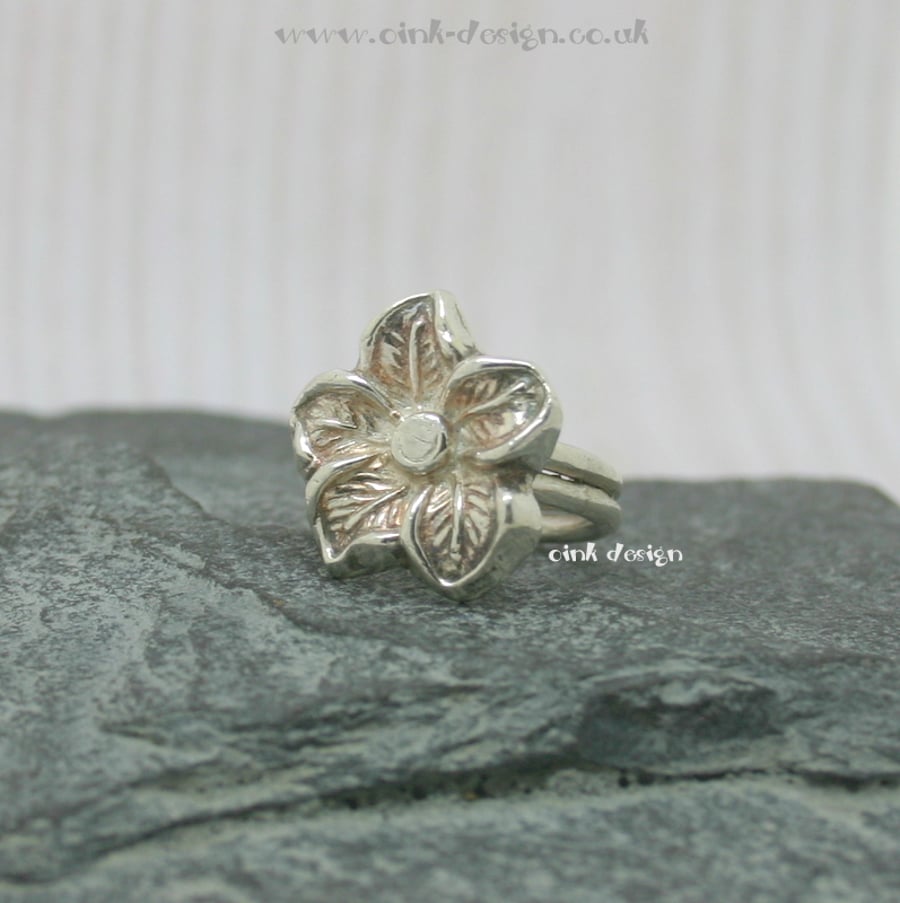 Sterling silver double band ring size N with a fine silver flower