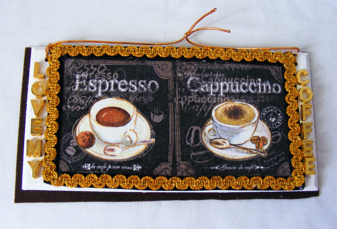 Decoupaged love my coffee wall decoration.