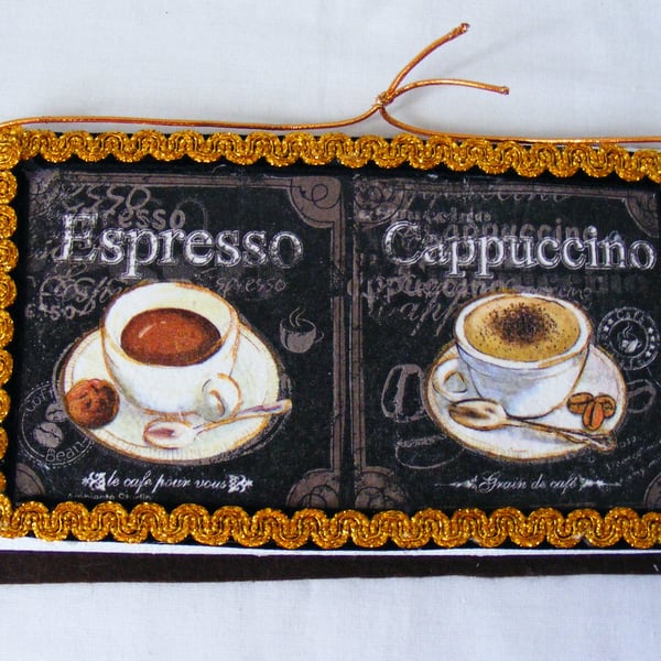 Decoupaged love my coffee wall decoration.
