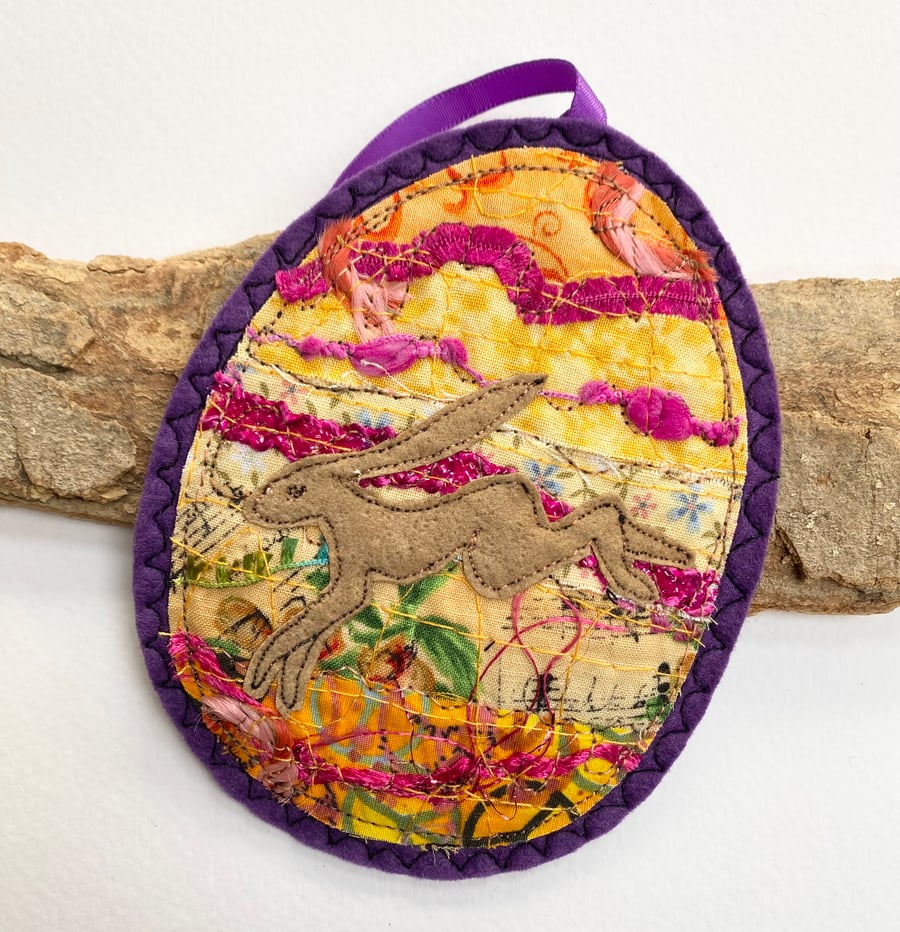 Upcycled embroidered Easter egg and hare home decoration. 