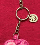 Crochet heart keyring and bag clip in shades of pink  - Image 3