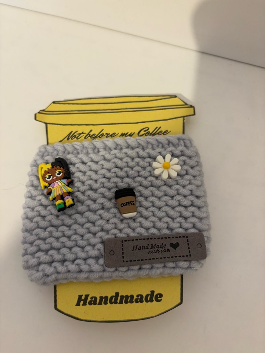 Sweet girl knitted cup cosy. 