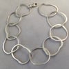 Silver oval loop bracelet
