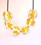 Handmade white and orange patterned lamp work glass beads - Image 2