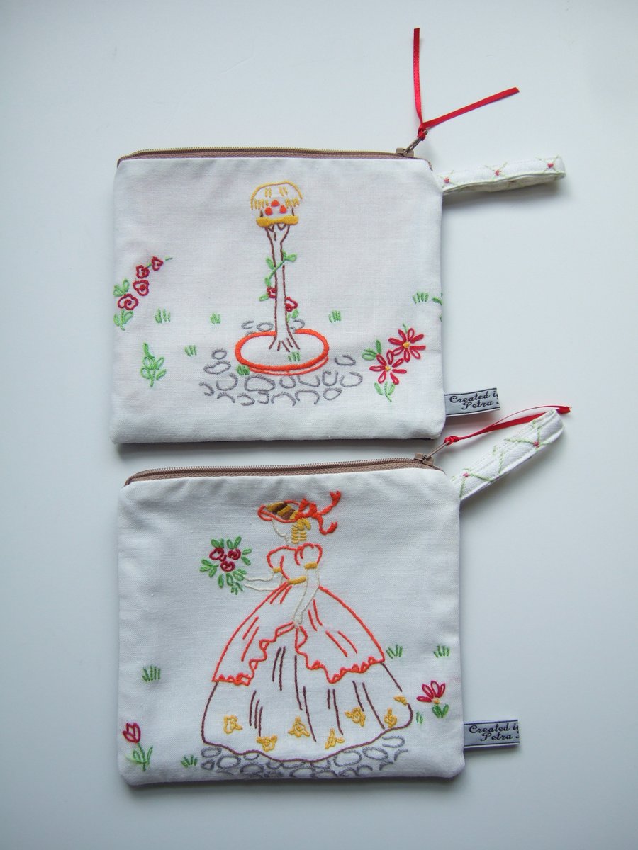 A matching pair of vintage embroidered purses. A Crinoline lady and her dovecot.