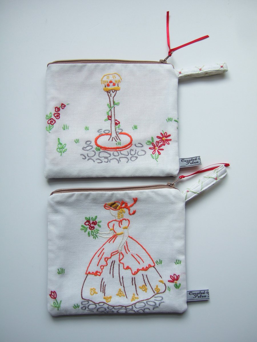 A matching pair of vintage embroidered purses. A Crinoline lady and her dovecot.