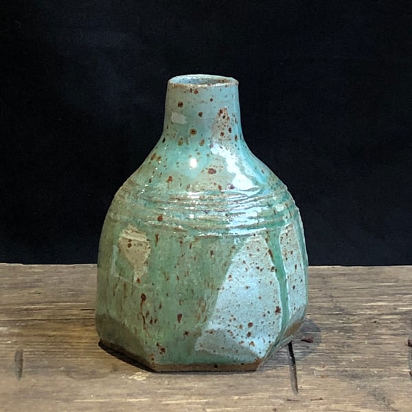 Drippy glazed bud vase with texture