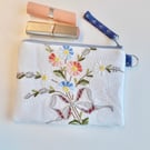 Make up bag zipped in reclaimed embroidered cloth and Laura Ashley lining 