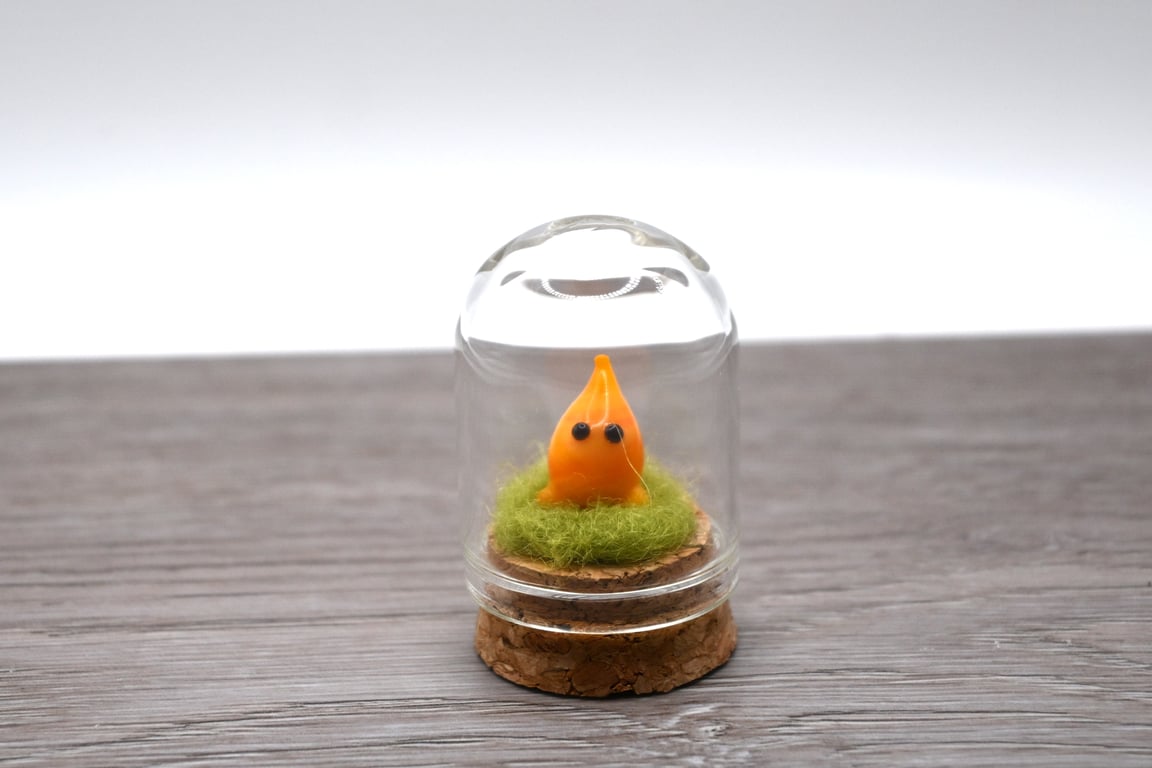 small glass wisp keepsake figure