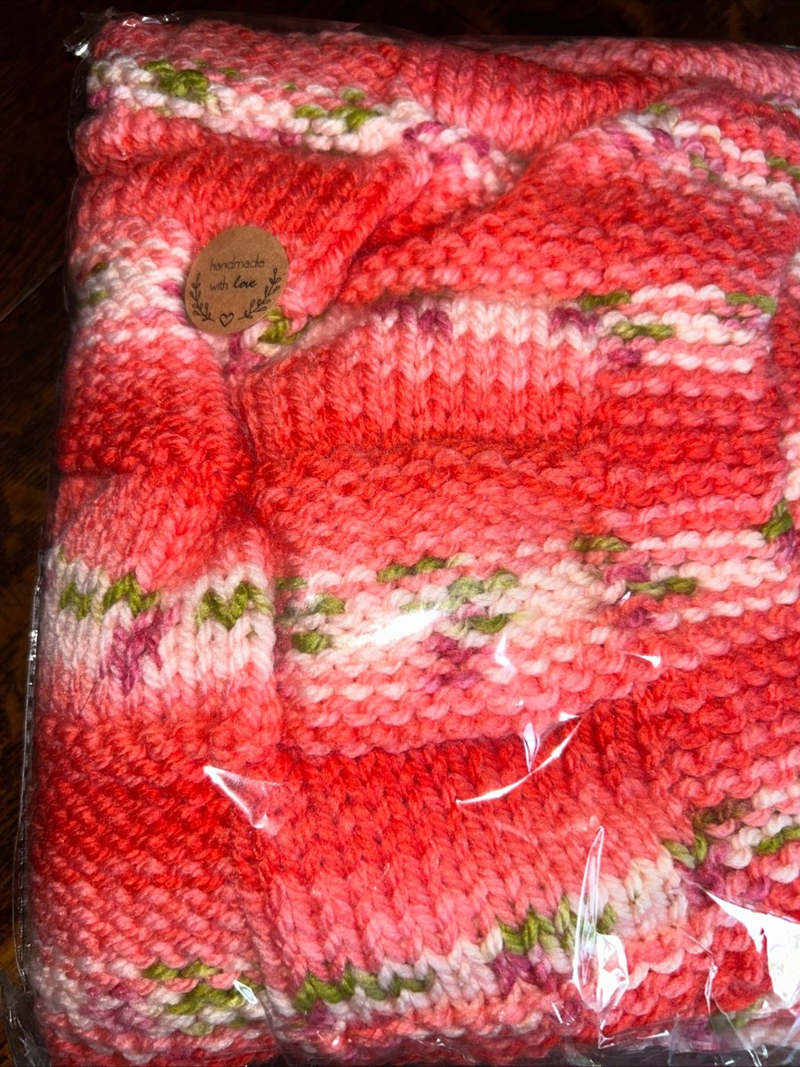 Handknitted baby blanket in Hayfield Baby Blossom chunky wool