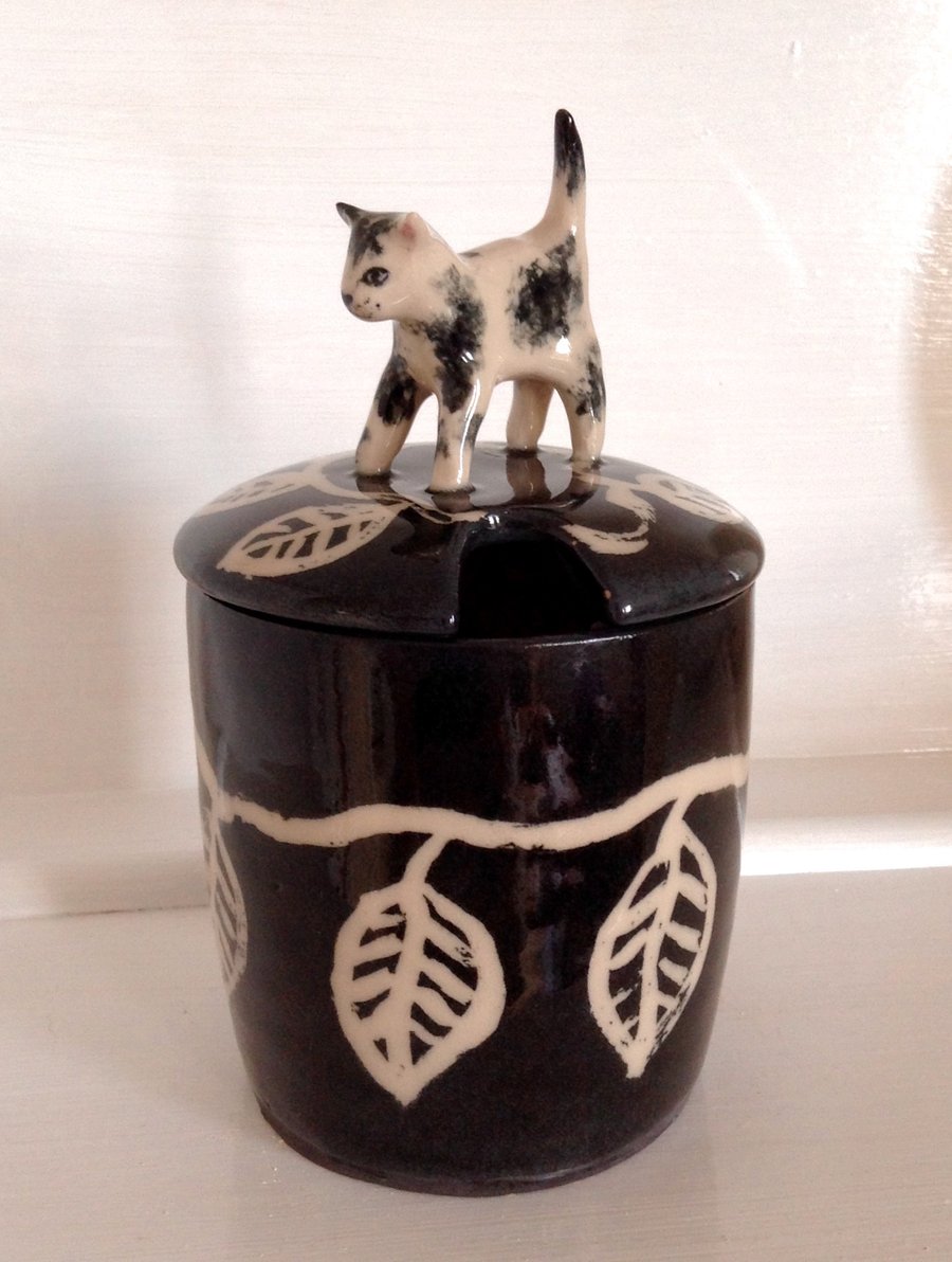 Stoneware lidded jar with cat top