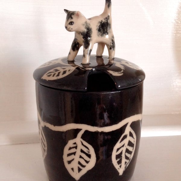 Stoneware lidded jar with cat top