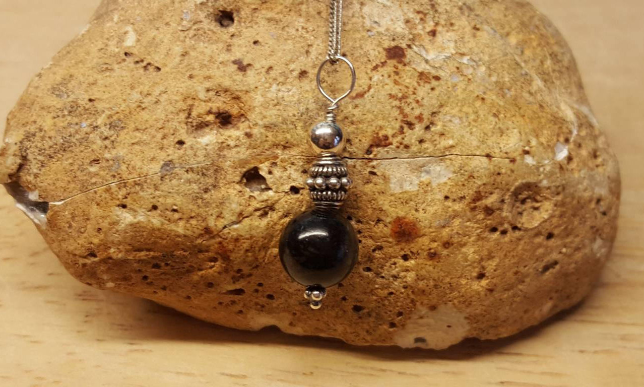 Rare Arfvedsonite pendant necklace. Reiki charged