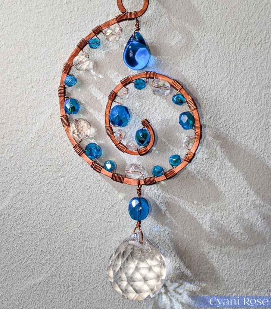 Pretty Spiral suncatcher Blue and copper with sparkly prism