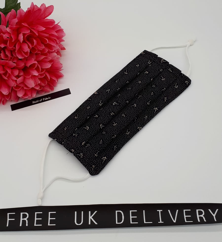 Face mask,  medium,  adjustable,  nose wire, washable in black flower dot 
