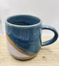 Stoneware Coffee mug blue and white with sand effect from glimpse of base clay