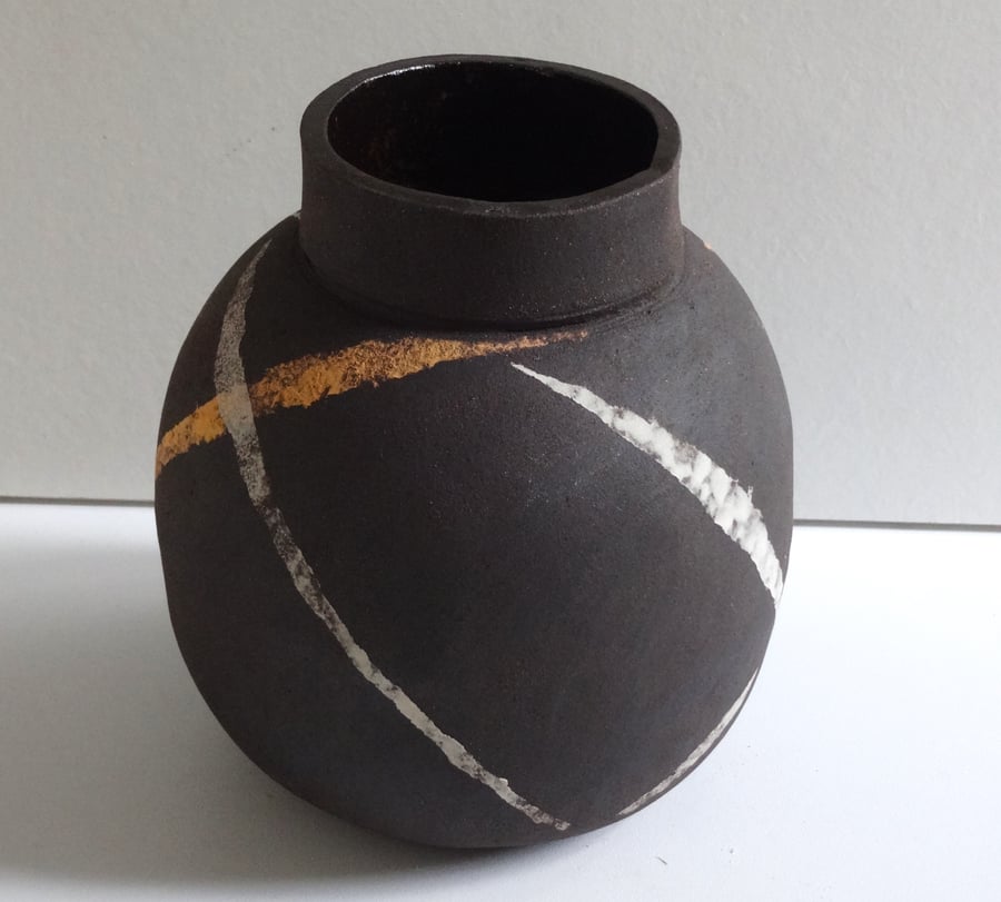 Moon jar, spherical vase. Handmade ceramic with swirl decoration, interior decor