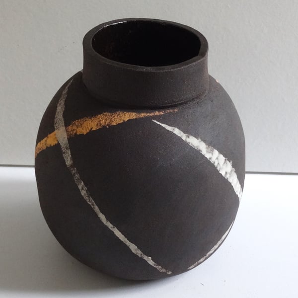 Moon jar, spherical vase. Handmade ceramic with swirl decoration, interior decor