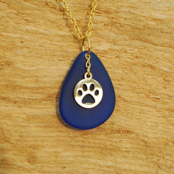 Beach glass pendant with paw print charm