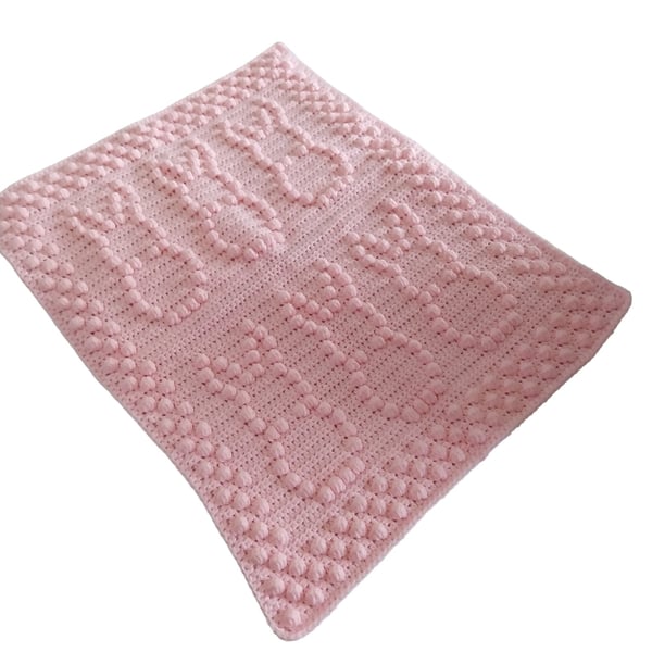 Crochet baby blanket in pink with puff bobbly bunny pattern
