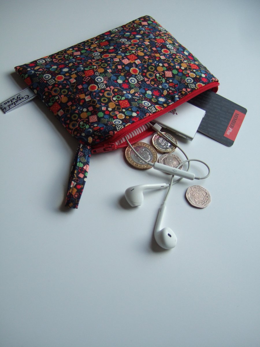Liberty fabric purse, make up bag, or headphones case. 