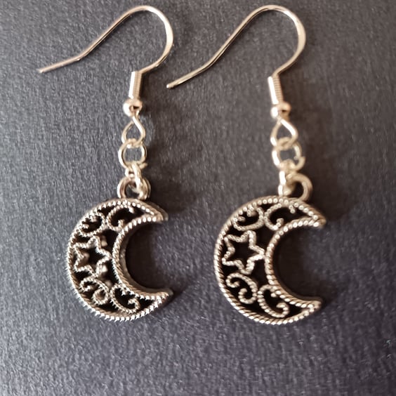 Silver moon and star detail dangle earrings 
