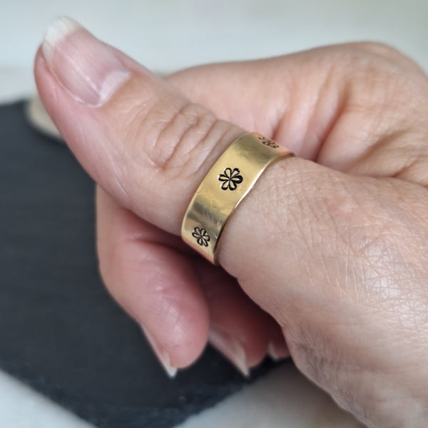 Golden handstamped flower ring in brass